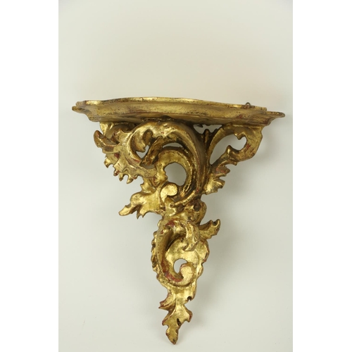 372 - A pair of late 18th Century carved giltwood Reliquary Stands, with shield shaped apertures, now with... 