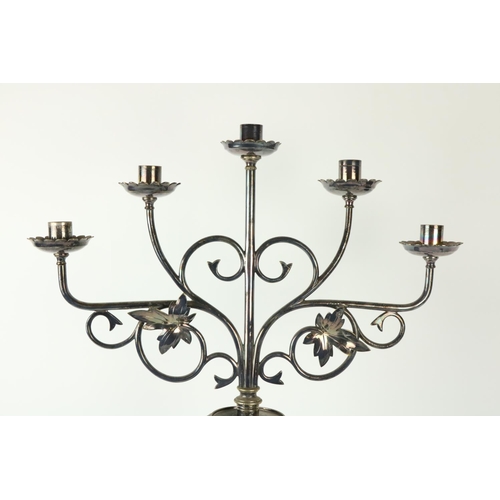 374 - A pair of tall four branch silver plated Altar Candelabra, with scrolling arms and reeded stems on t... 