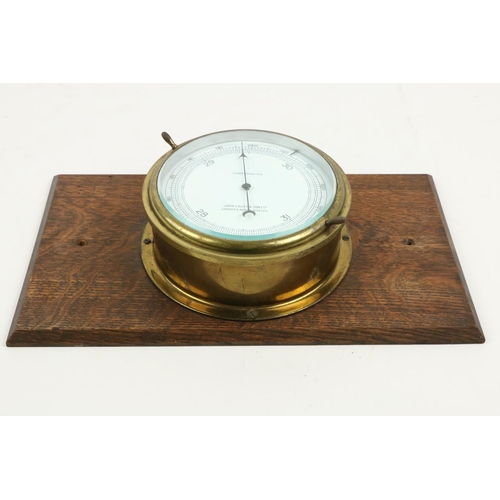 385 - A circular bass compensated Ships Barometer, by John Lilley & Son, Limited, London & North S... 