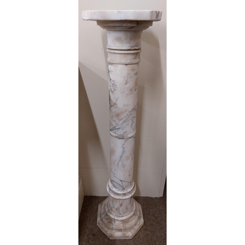 401 - A late 19th Century speckled white marble Plinth, the square top with canted corners, on a cylindric... 