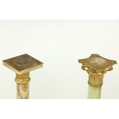 417 - Two similar French onyx Plinths, one with Corinthian ormolu capital on cylindrical stem with square ... 