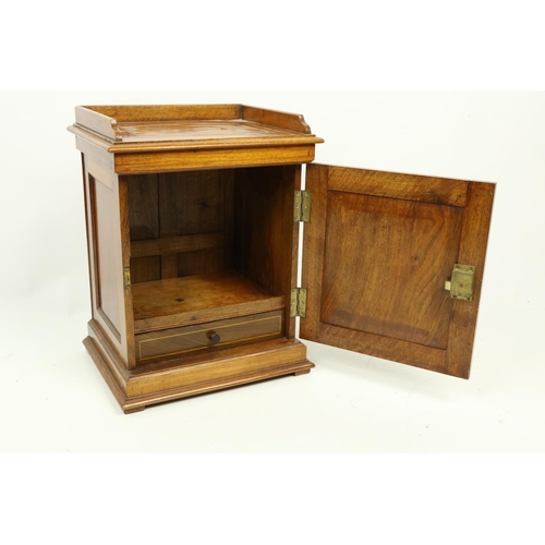 446 - An attractive inlaid Table Cabinet, with three-quarter gallery above a door enclosing a vacant compa... 