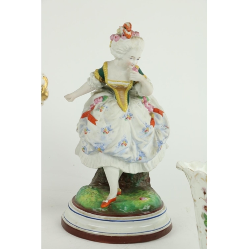 451 - A pair of French porcelain Figures, modelled as an elegant Gent & Lady, 10 1/2