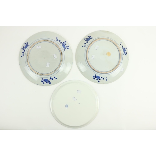 476 - A pair of Japanese blue and white Saucer Dishes, each decorated with a river landscape, 13