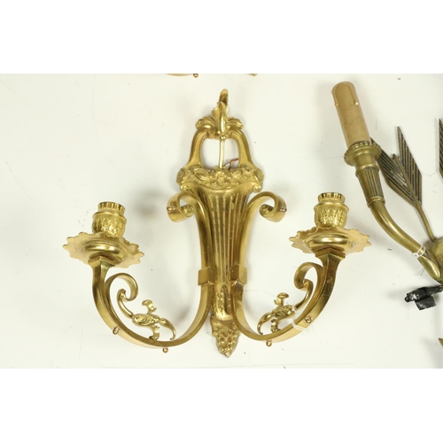 506 - A pair of cast gilt brass two branch Wall Lights; together with another pair of two branch Wall Ligh... 