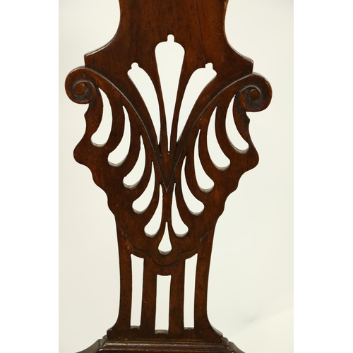 517 - A George III period mahogany Open Armchair, with shaped top rail above an ornate pierced splat over ... 