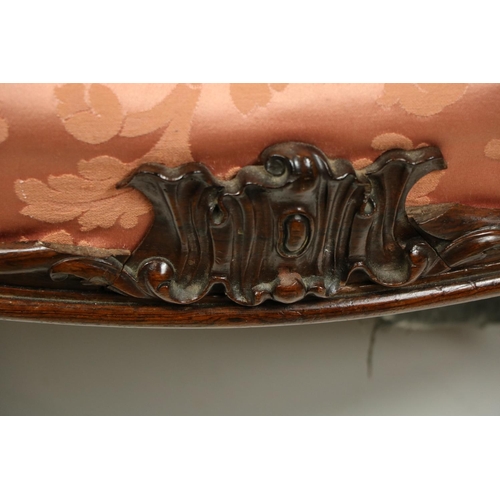 520 - A very fine carved rosewood and serpentine fronted Settee, the top rail with a cartouche crest ... 