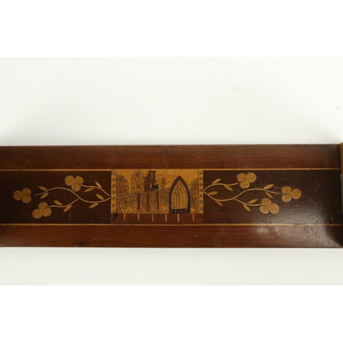 85 - A Killarney yew-wood and marquetry Bookstand, 19th Century, inlaid with abbey ruins, harps and shamr... 