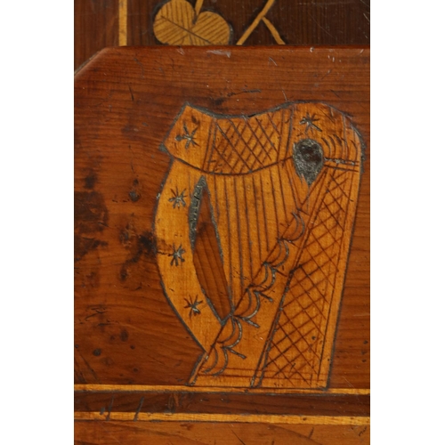 85 - A Killarney yew-wood and marquetry Bookstand, 19th Century, inlaid with abbey ruins, harps and shamr... 