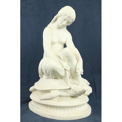 97 - A 19th Century carved marble Group, a semi-nude Woman seated on a tortoise on oval base, 20