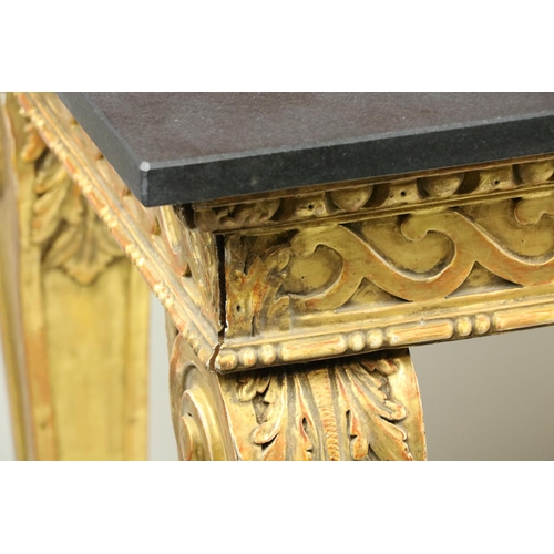 99 - A fine pair of William Kent style carved giltwood Console Tables, each with a Vitruvian scroll carve... 