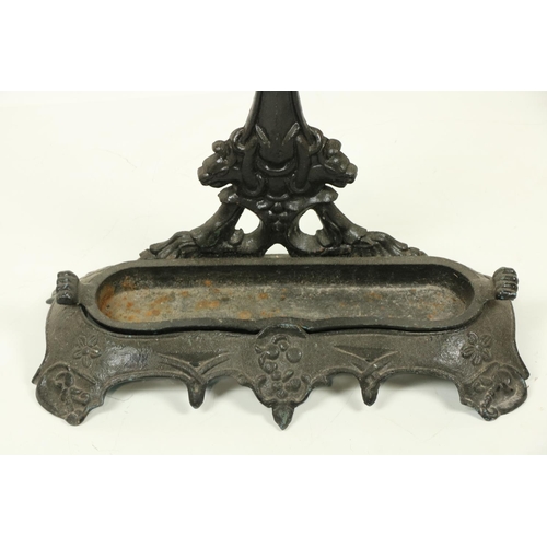 1002 - A Victorian cast iron Stick and Umbrella Stand, decorated with grapes and vine leaves on shaped base... 