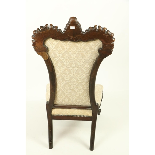 1006 - A 19th Century French shield shaped stained walnut Nursery Chair, with carved crested back covered i... 