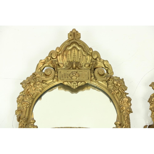 1007 - A very attractive pair of gilt Mirror Wall Brackets, each with a stylized shell crest above three sh... 