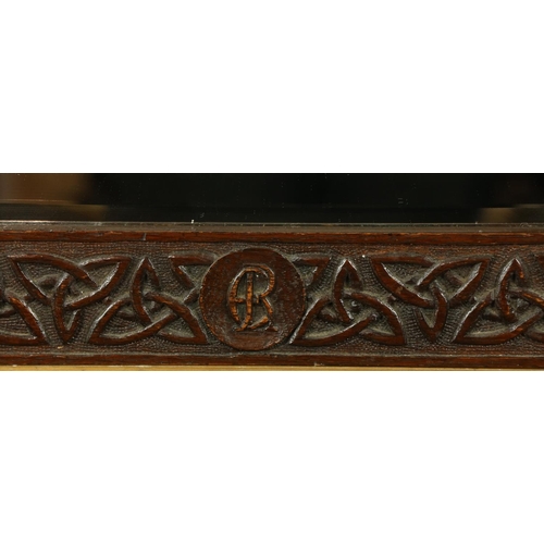 1036 - A Celtic carved oak Wall Mirror, crested and with the motto 'Virtule Non Verbis' on a ribbon design,... 