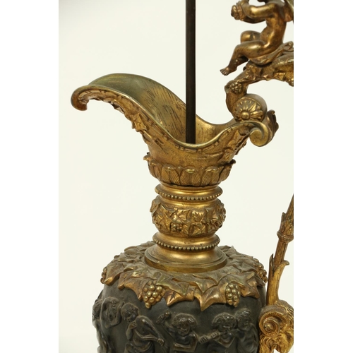 1038 - A heavy Neo-Classical style bronze and gilt bronze Ewer, with rustic handles surmounted, a cherub te... 