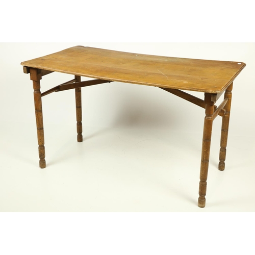 1050 - A 20th Century pine folding Campaign Table, on four turned legs, 43