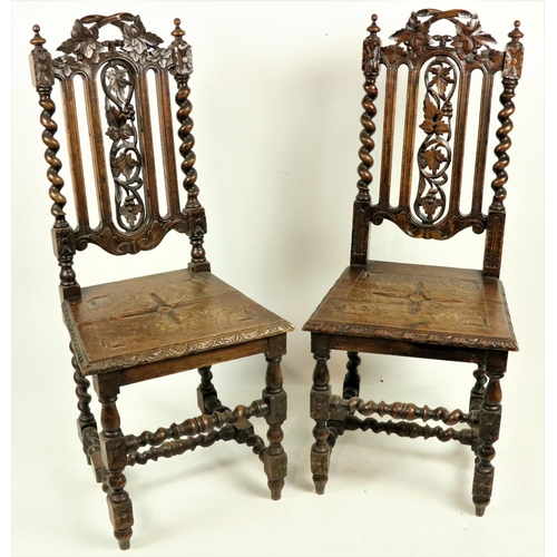 1057 - A pair of 17th Century style carved oak Side or Hall Chairs, each with solid seat. (2)... 