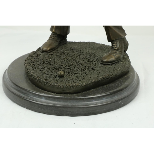 1073 - An attractive bronzed metal model of a Golfer, performing a swing, on circular granite base, approx.... 