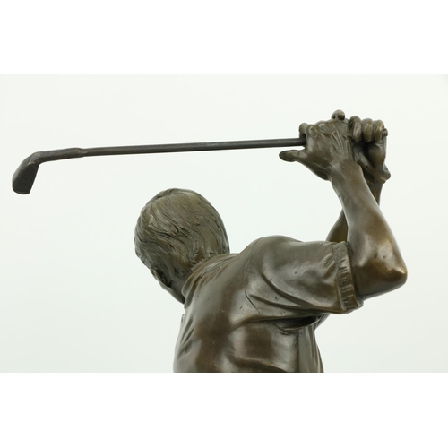 1073 - An attractive bronzed metal model of a Golfer, performing a swing, on circular granite base, approx.... 