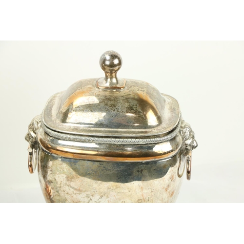 646 - A pair of Old Sheffield silver plated Urns and Covers, each with two lion mask and ring handles and ... 