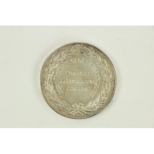 648 - A Royal Dublin Society silver Medal, for small Hunter Mare; together with another Medal Owners Assoc... 