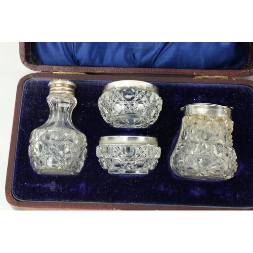 656 - Silver & Silverplate: A cased silver mounted and glass Condiment Set, a set of six mother-o-pear... 