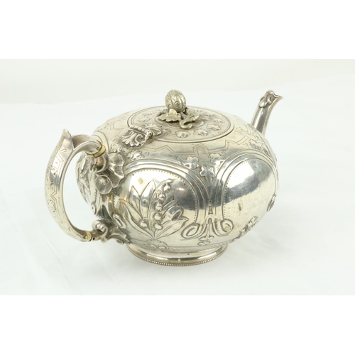 660 - A Victorian silver pumpkin shaped Teapot, London 1868, by ML & HL, embossed with scrolls and fol... 