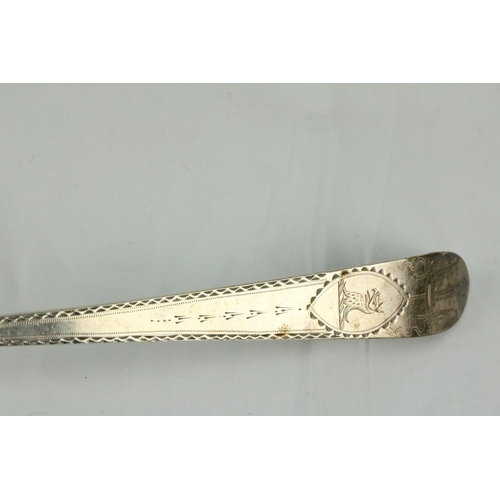 667 - A large Irish late 18th Century Soup Ladle, with bright cut handle, Dublin c. 1792, approx. 6ozs, c.... 