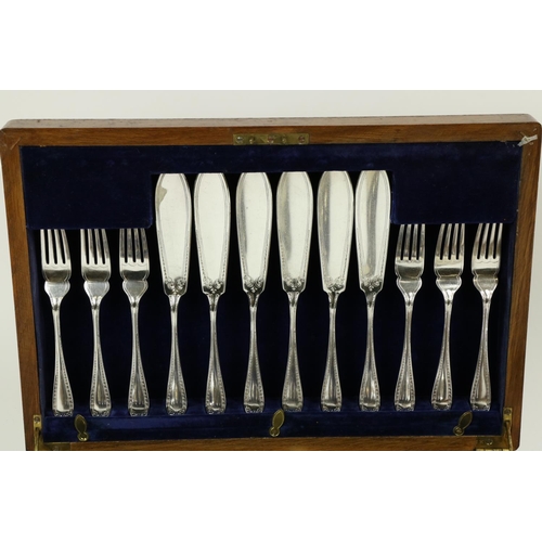 675 - A cased set of 24 Fish Knives and Forks, (12 + 12) in fitted wooden case, together with a cased set ... 