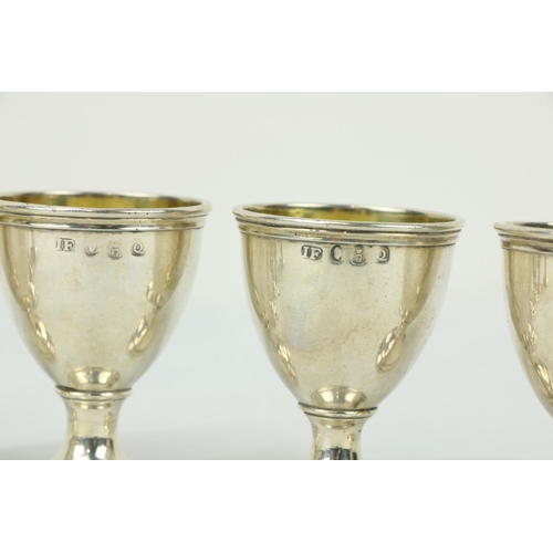 679 - A set of 8 silver Egg Cups. (8)