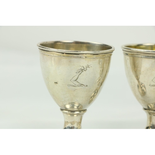 679 - A set of 8 silver Egg Cups. (8)