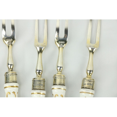 680 - A set of 16, silver Fruit Knives & Forks (8 + 8), with porcelain handles, some damaged. (16)... 