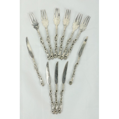 682 - A set of 11, (6+ 5) small silver Fruit Knives & Forks, with decorated handles. (11)... 