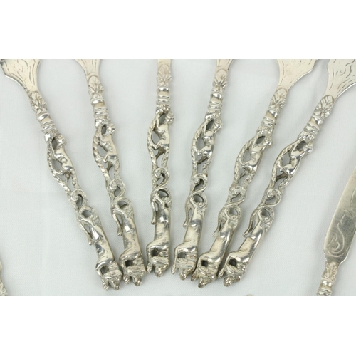 682 - A set of 11, (6+ 5) small silver Fruit Knives & Forks, with decorated handles. (11)... 