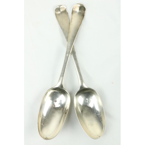 686 - A pair of early Irish Georgian silver Table Spoons, Dublin c. 1767, with decoration on back of bowls... 