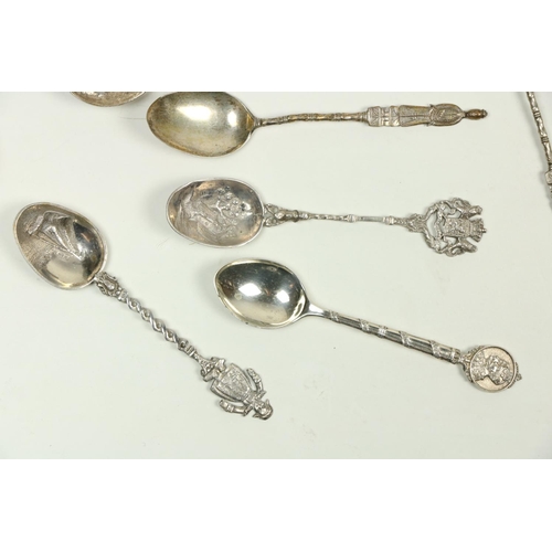 711 - A good collection of over 20 English & Continental silver Souvenir Spoons, attractively decorate... 