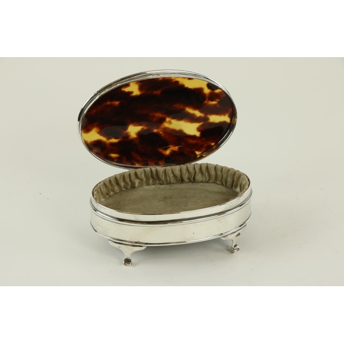 718 - An oval Birmingham silver and tortoiseshell Dressing Table Jewellery Casket, on scroll legs, 5 1/4