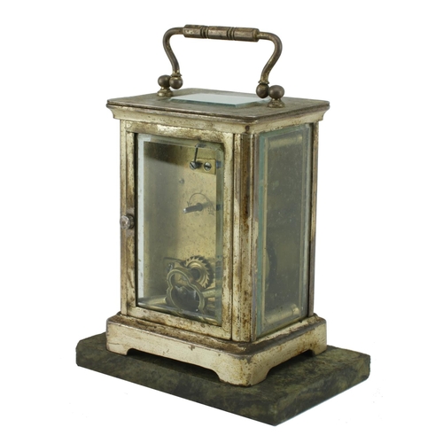 747 - A small 19th Century English brass cased Carriage Clock, on a green marble base (loose). (2)... 