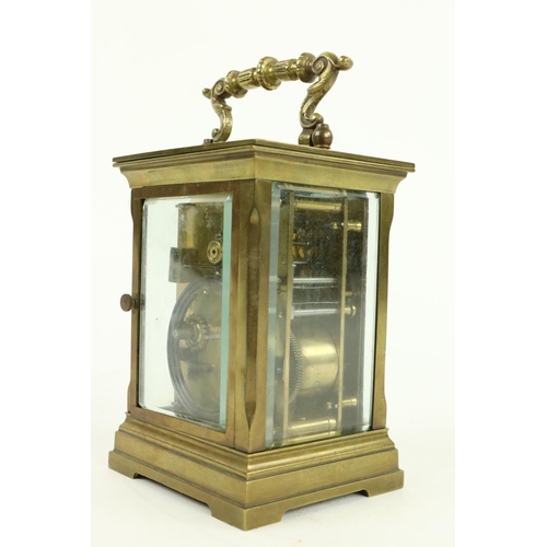 748 - A heavy brass five glass French Carriage Clock, the white dial with Roman numerals and with swing ha... 