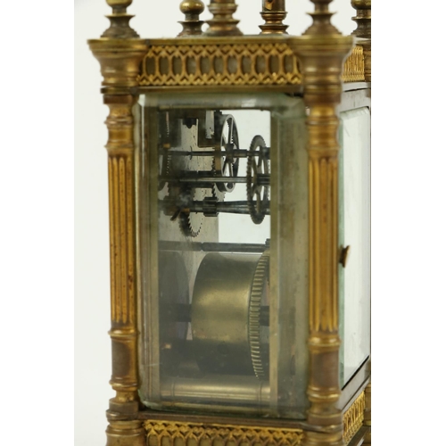 749 - A 19th Century ormolu cased Carriage Clock, with filigree design, enamel face, reeded pillars and hi... 