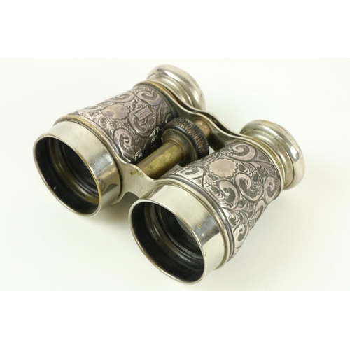 750 - A good pair of silver mounted brass Opera Glasses, with London hallmarks, in leather case; another s... 