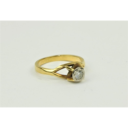 779 - An attractive gold Ladies Solitaire Ring, by John Roche, of Art Deco style, high set stone with open... 