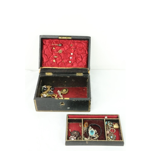 795 - Jewellery Box:   Containing some turquoise stones, some items with ruby type stones, 8 varied tie-pi... 