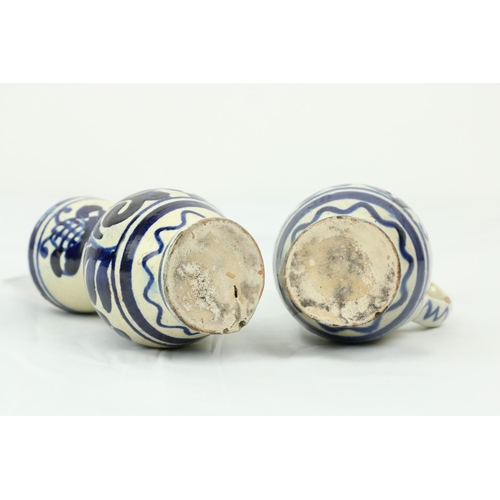 850 - A pair of late 17th / early 18th Century London Delft blue and white water/wine Cruets, each approx.... 