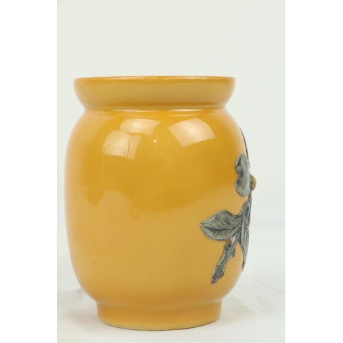 856 - Marjorie Stokes (1916 - 2014)A 1950's yellow ground porcelain Vase, of bulbous form with floral desi... 