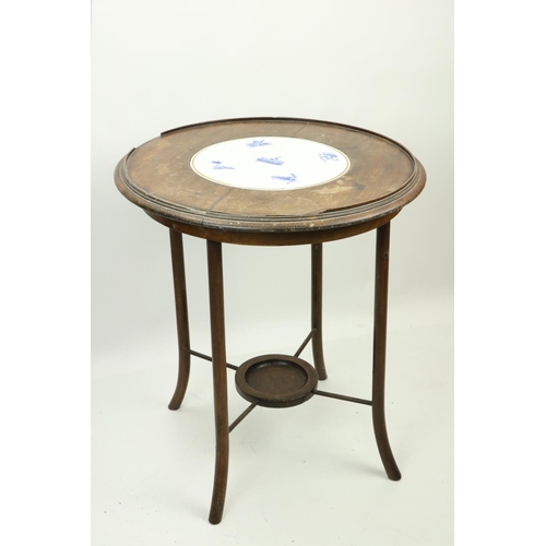 871 - An early 20th Century mahogany Occasional Table, with circular rotating top, inset with a blue and w... 