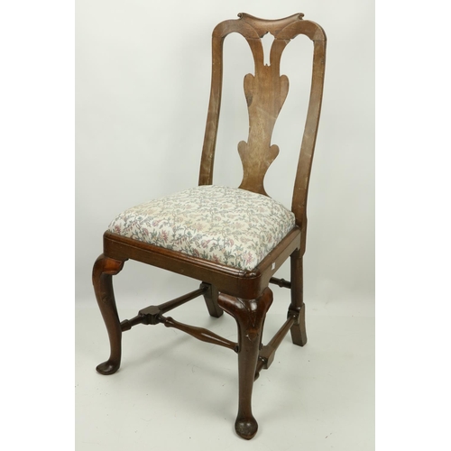 877 - A Queen Anne walnut Side Chair, c. 1710, with pierced vase shaped splat above a drop in seat on fron... 