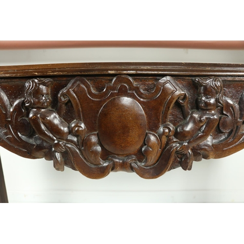 880 - A 19th Century Provincial carved pine Side or Console Table, the rectangular moulded top above an or... 