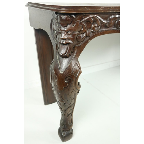 880 - A 19th Century Provincial carved pine Side or Console Table, the rectangular moulded top above an or... 